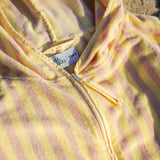 yellow and pink stripe poncho